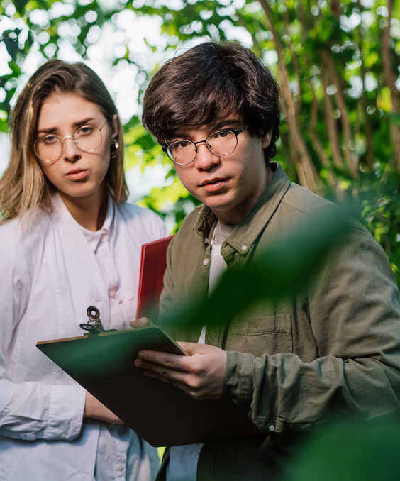 Young Agricultural Engineers Working In Greenhouse 2026 01 05 23 20 08 Utc
