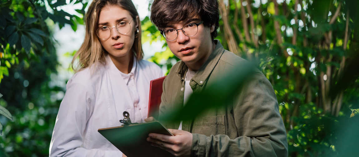 Young Agricultural Engineers Working In Greenhouse 2026 01 05 23 20 08 Utc