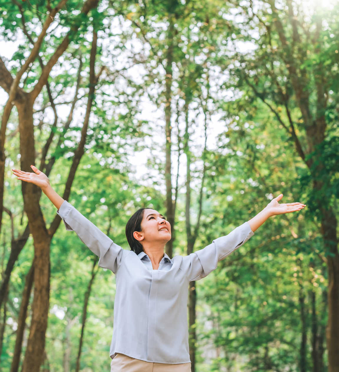 Asian Women Raise Their Hands To Nature